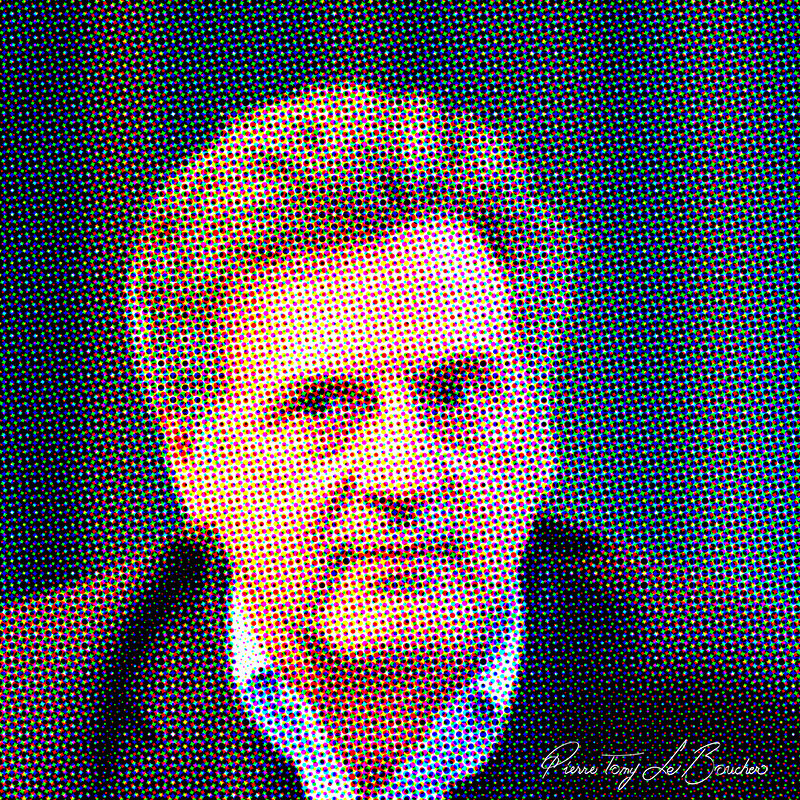 Portrait de Daniel Auteuil traité par dilution optique, composé d’une trame très visible de points cyan, magenta, jaunes et noirs.