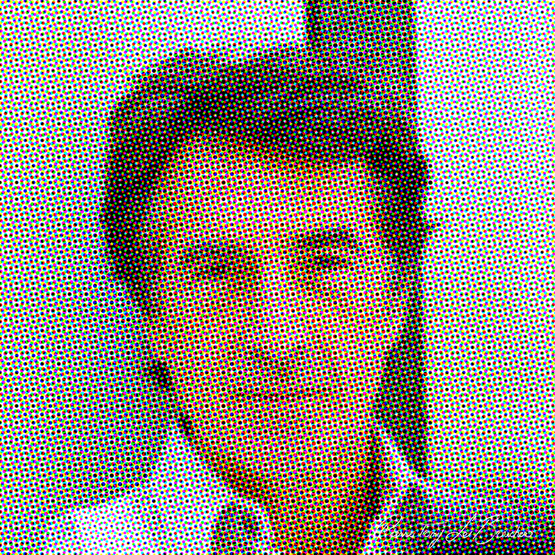 Portrait de François Cluzet traité par dilution optique, composé d’une trame très visible de points cyan, magenta, jaunes et noirs.