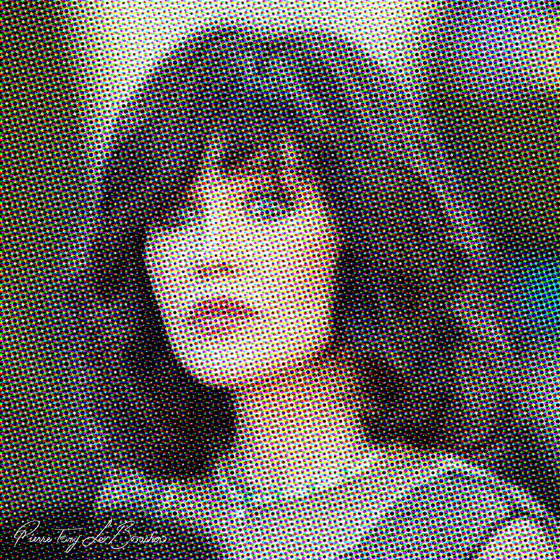 Portrait d’Isabelle Adjani traité par dilution optique, composé d’une trame très visible de points cyan, magenta, jaunes et noirs.