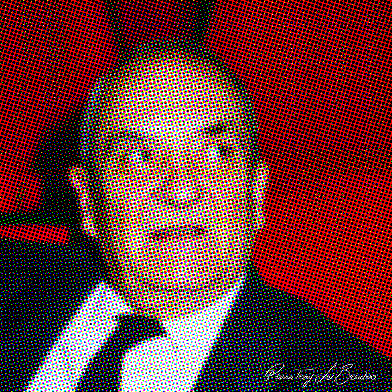 Portrait de Jean Carmet traité par dilution optique, composé d’une trame très visible de points cyan, magenta, jaunes et noirs.