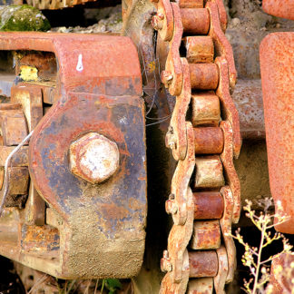 Chaîne rouillé possédant les stigmates du temps et de l'usage.