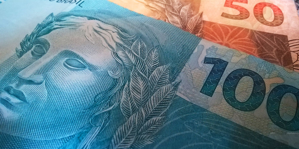 Des billets de banque symbolisant la réussite d'un projet pour nos clients