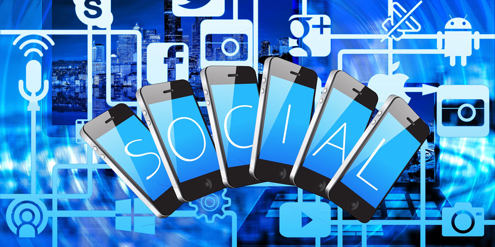 La communication par les réseaux sociaux sous la forme d'une illustration présentant six téléphones avec chacun une lettre et formant le mot social
